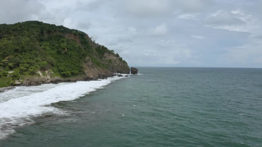 Aerial of the shoreline on a small island cove