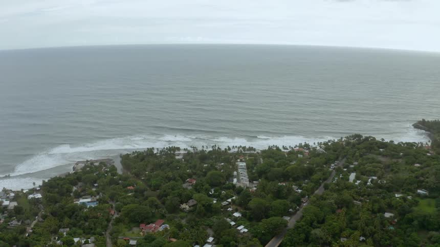 Aerial view of small tropical coastal town
