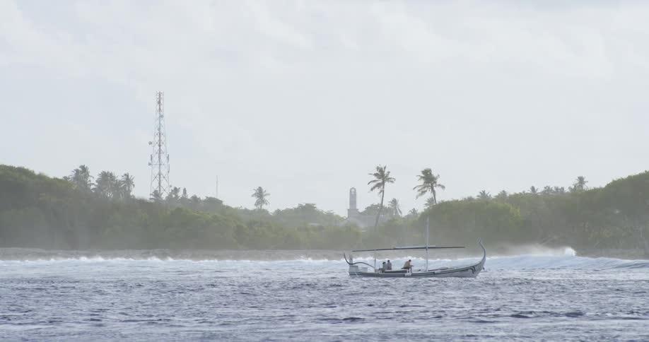 Fishing boat in the ocean near coast