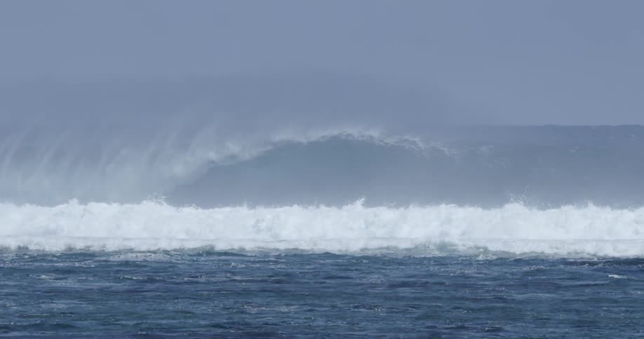 Large waves crashing near the shore in the ocean