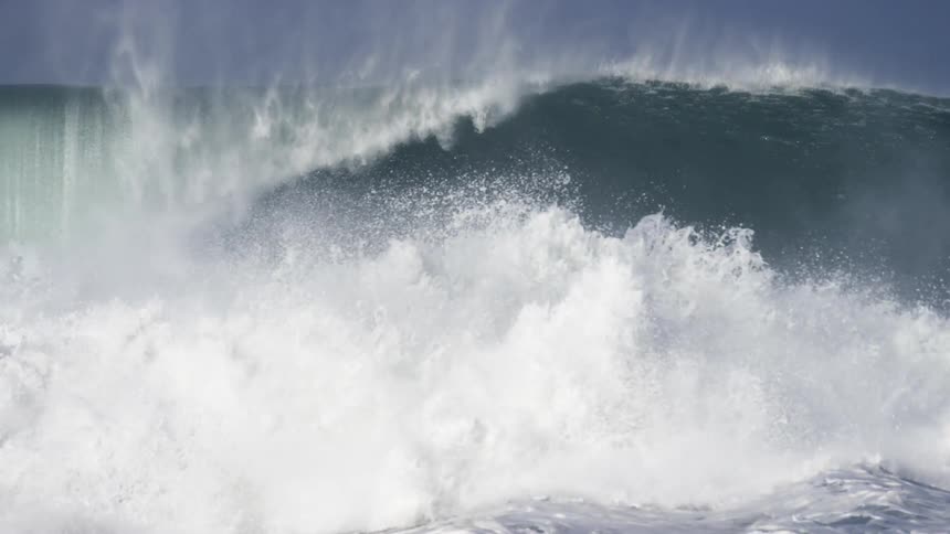 View of large wave breaking with lots of foam