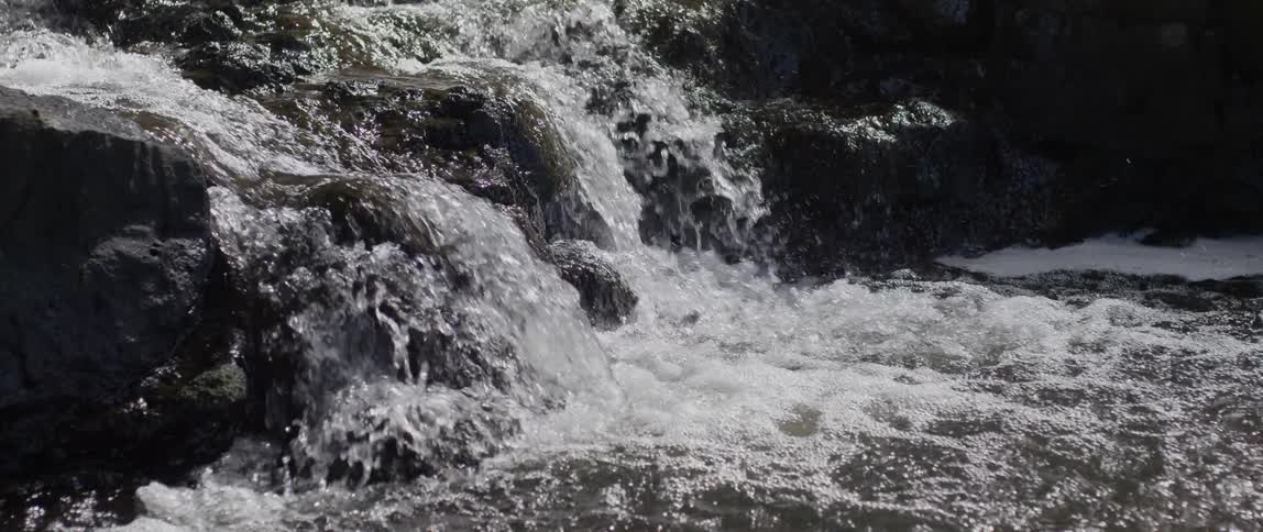 Water crashing down and over rocks in a stream