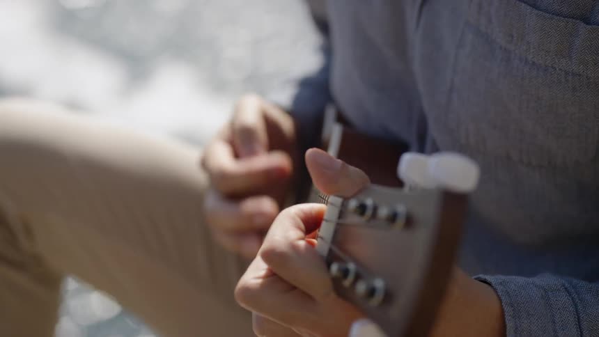 A person is playing an instrument outdoors