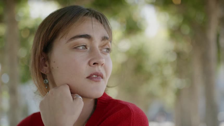 A woman looks around