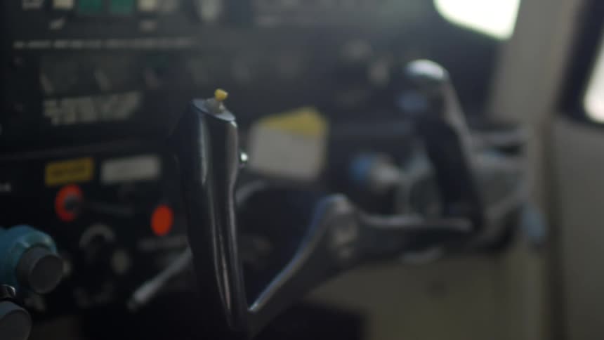 The controls of a helicopter and the instrument dashboard