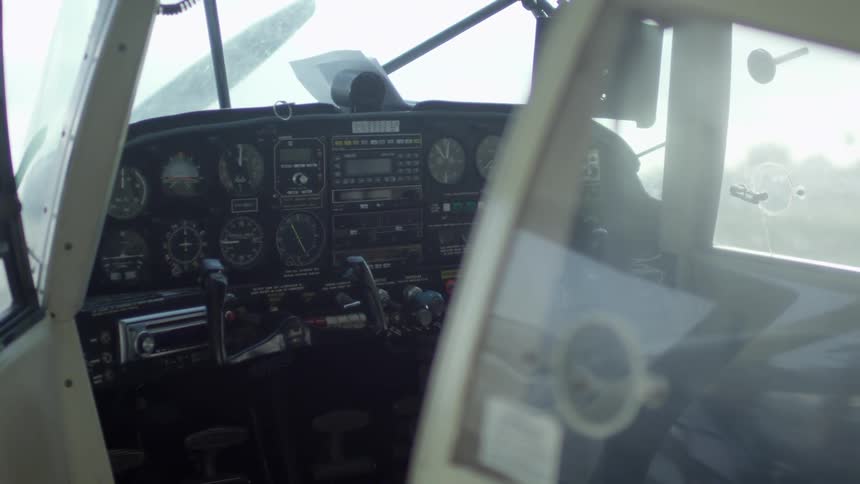 The cockpit of a small aircraft is shown