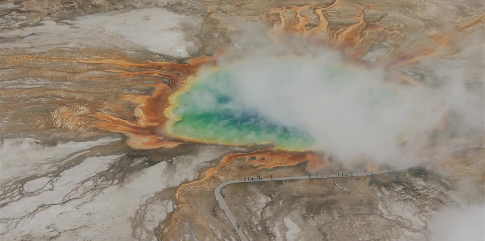 Hot springs with steam in a valley
