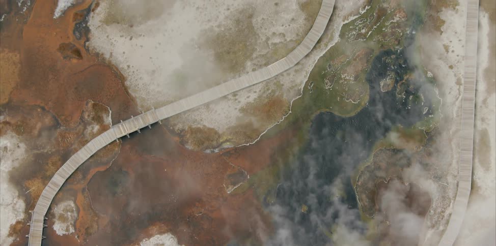 Steam rises out of a geothermal pool