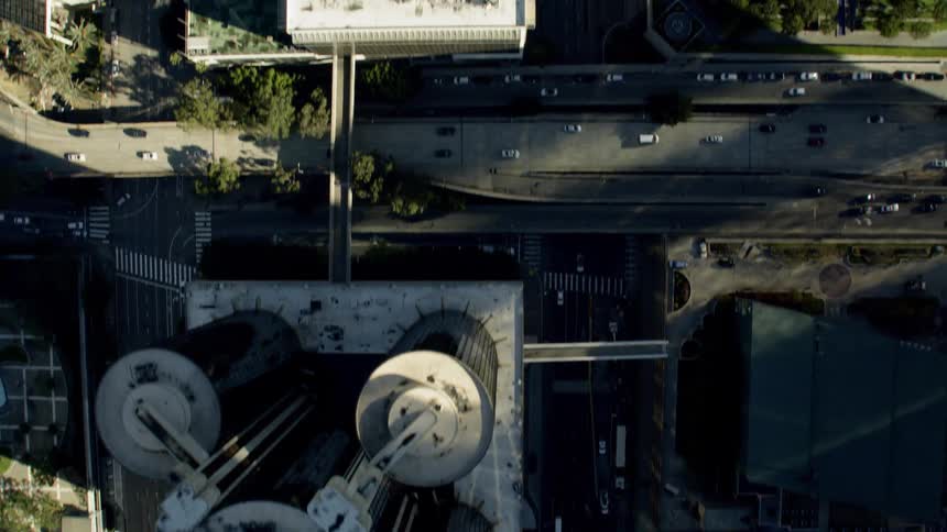 Birds Eye View of City streets with lots of cars traveling on the roads