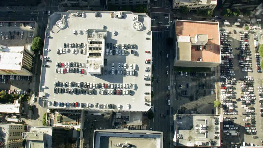 A city downtown with roads filled with traffic