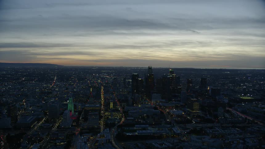Aerial view of cityscape at sunset
