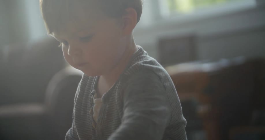 A child is in a room during spring