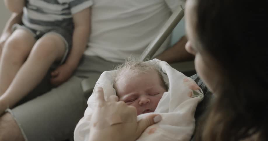 A family sits in the hospital