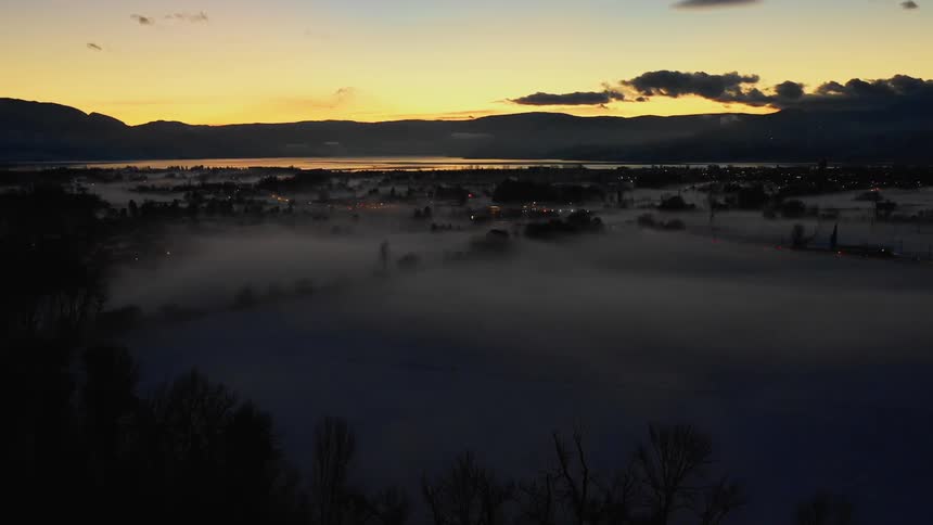 Landscape view of fog over a neighborhood