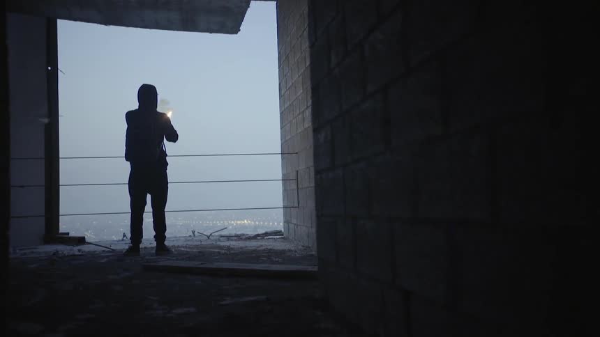 Man With Flare In High Rise