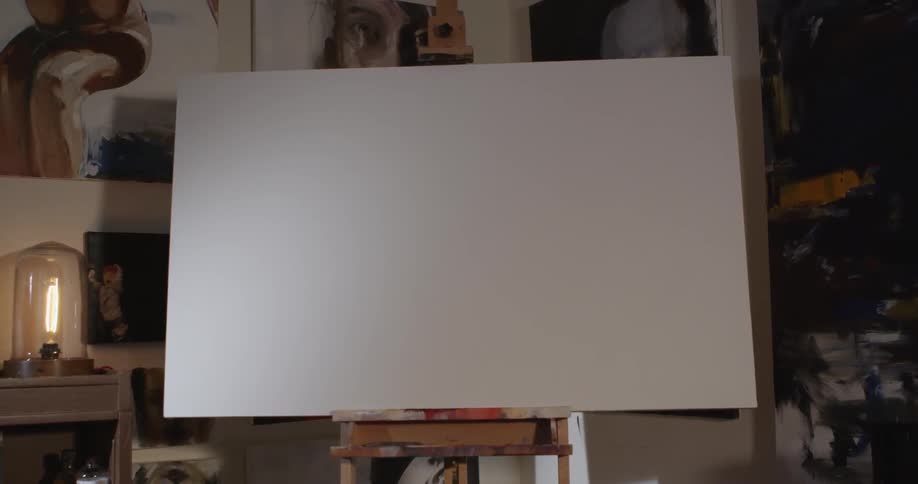 A blank white canvas in an artists room