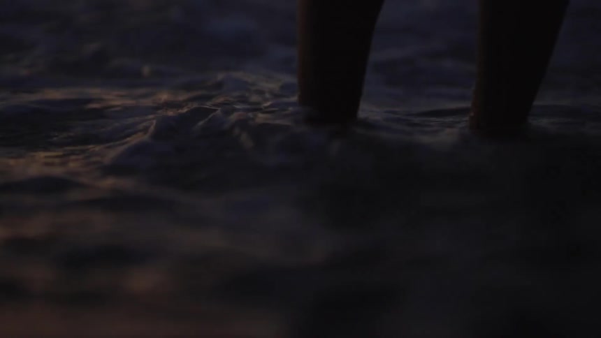 A person stands in the water