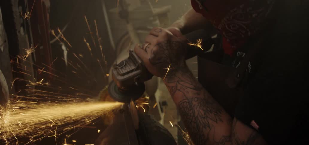 A man files the tool