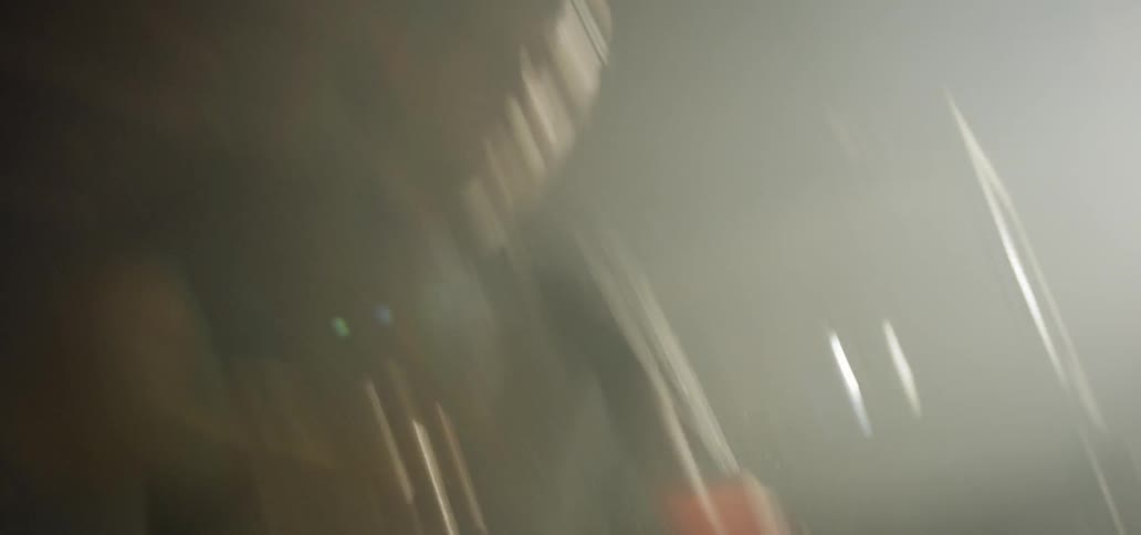 A man is using a hammer indoors