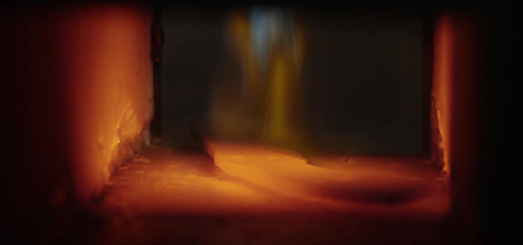 Metal is heated to a glowing red hot in a blacksmiths forge