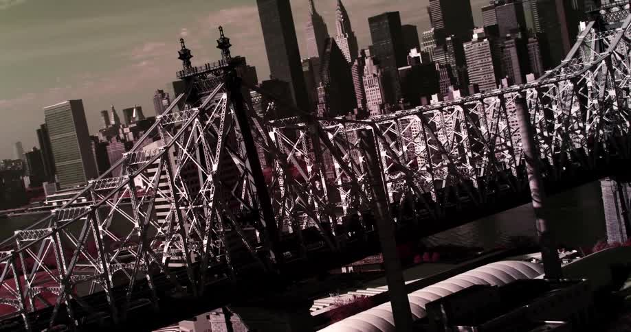 The bridge is busy with cars traveling to the city