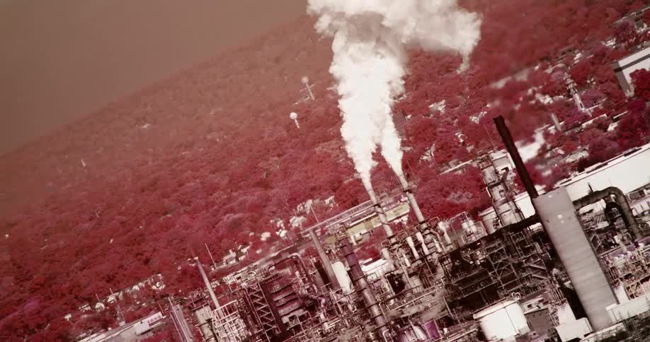 Smog billowing from smokestacks in a factory