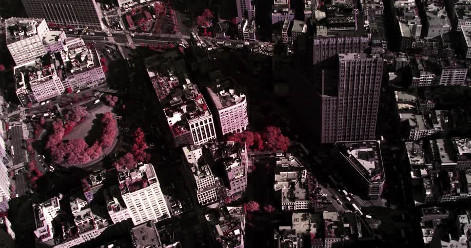 A very dense urban city is packed full of tall buildings and skyscrapers
