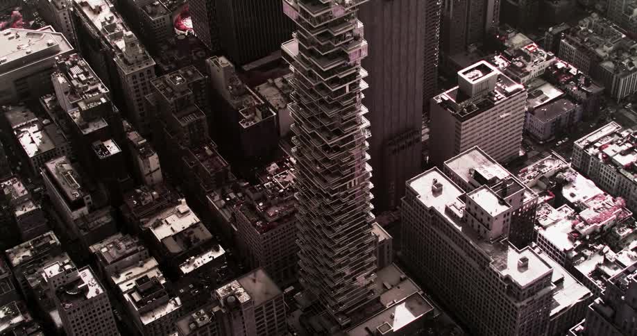 A stylish skyscraper tower in a metropolis during the day
