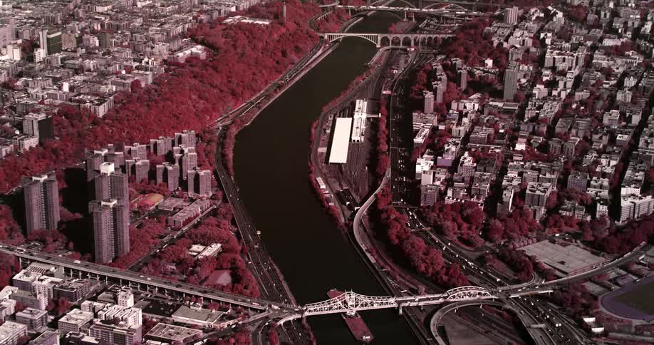 The buildings surround the river