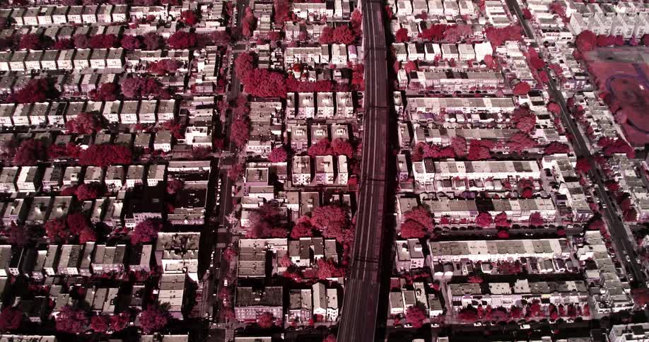 Birds eye view of houses in a city grid