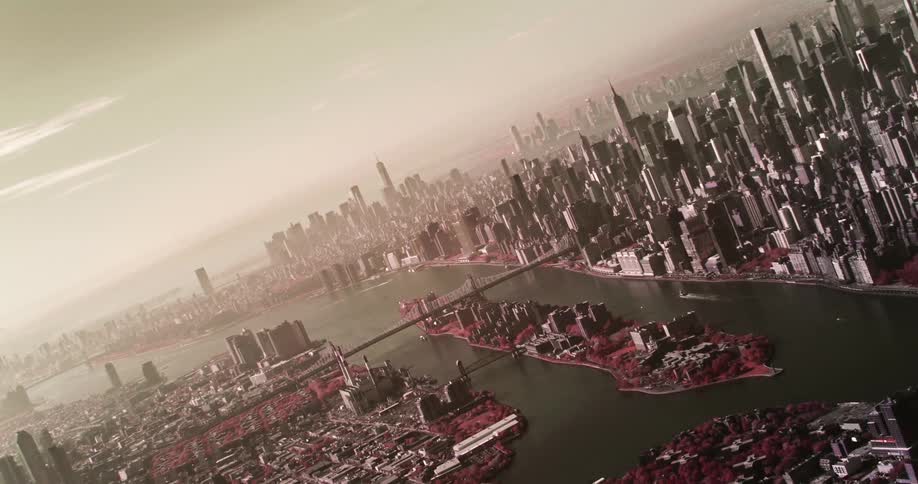 An aerial view of a city with skyscrapers on a foggy day