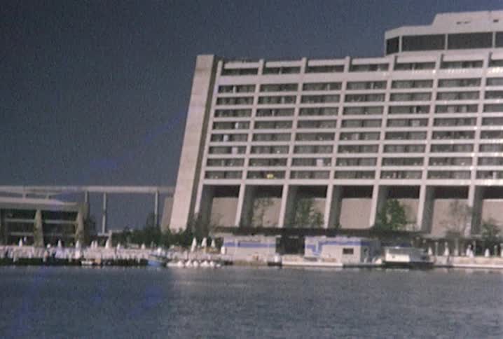 View of a large building near the docks by water
