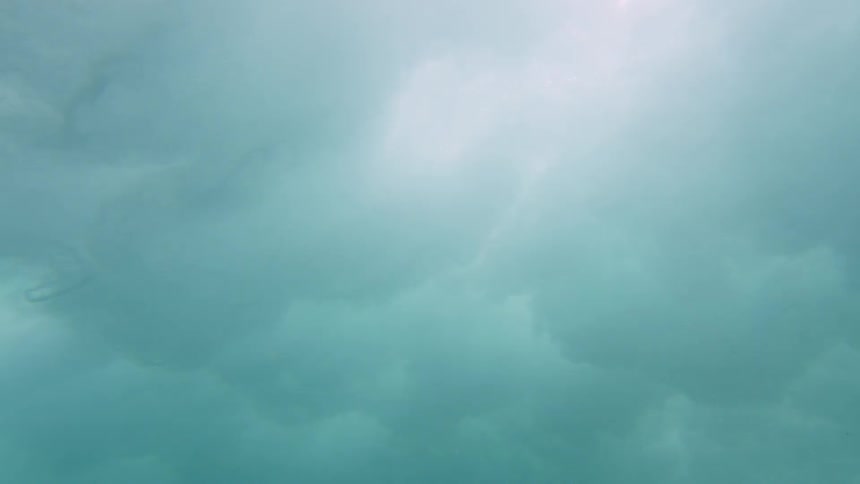 Underwater view of waves and water moving