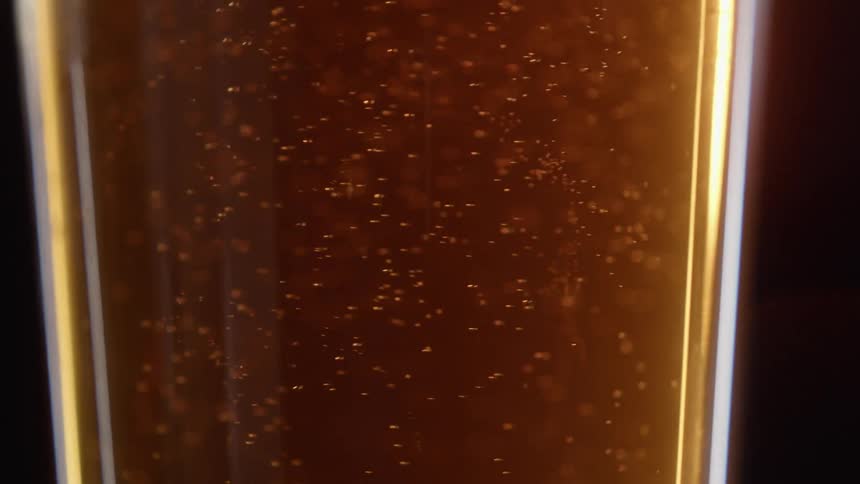 Close up of a glass filled with beer