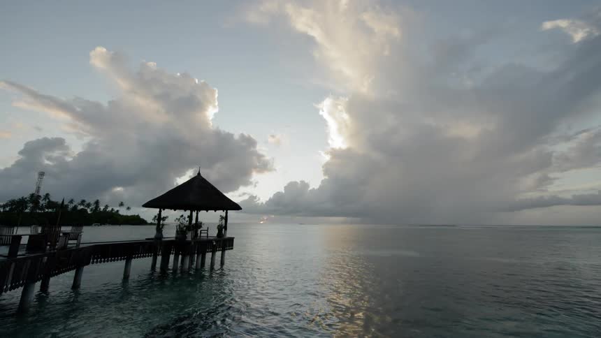 Walkway over the water at sunrise