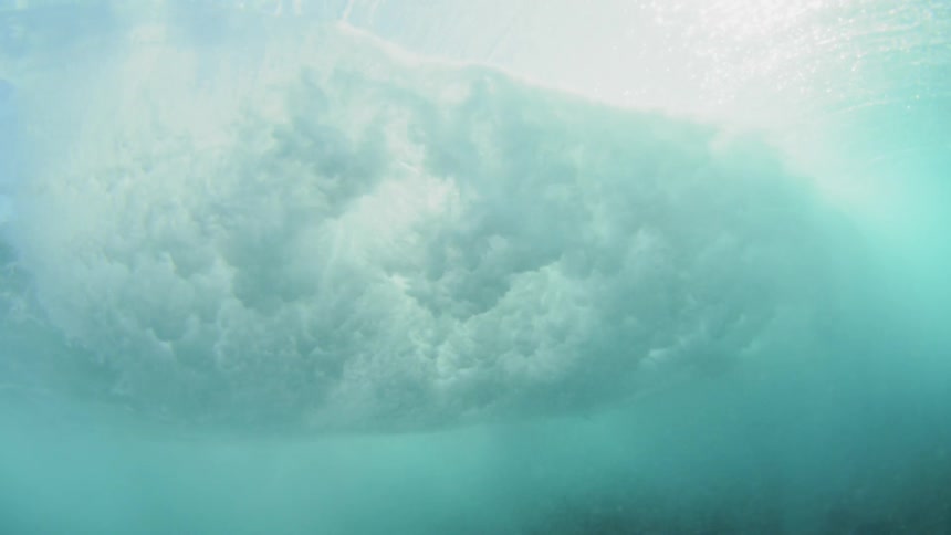 Underwater view of waves crashing in the ocean