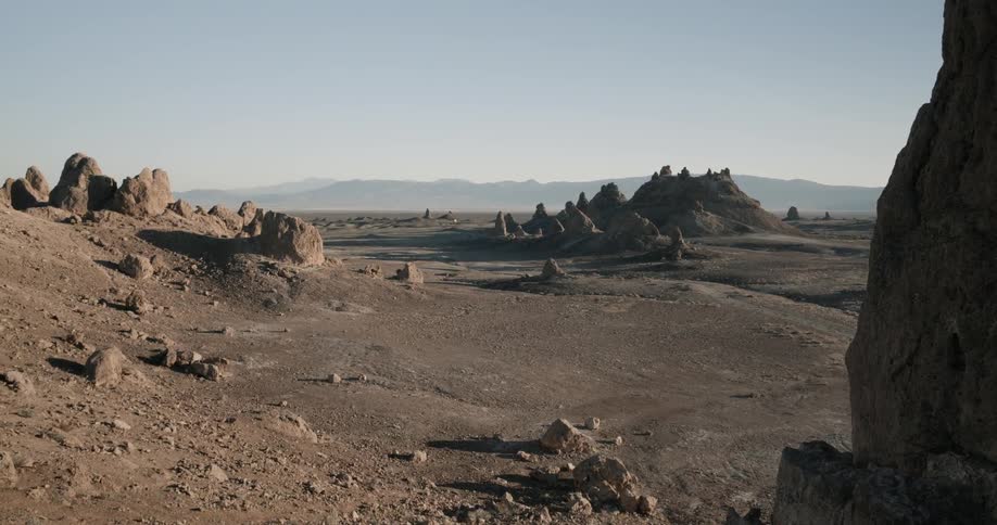 Rocks form small hills through the dirt