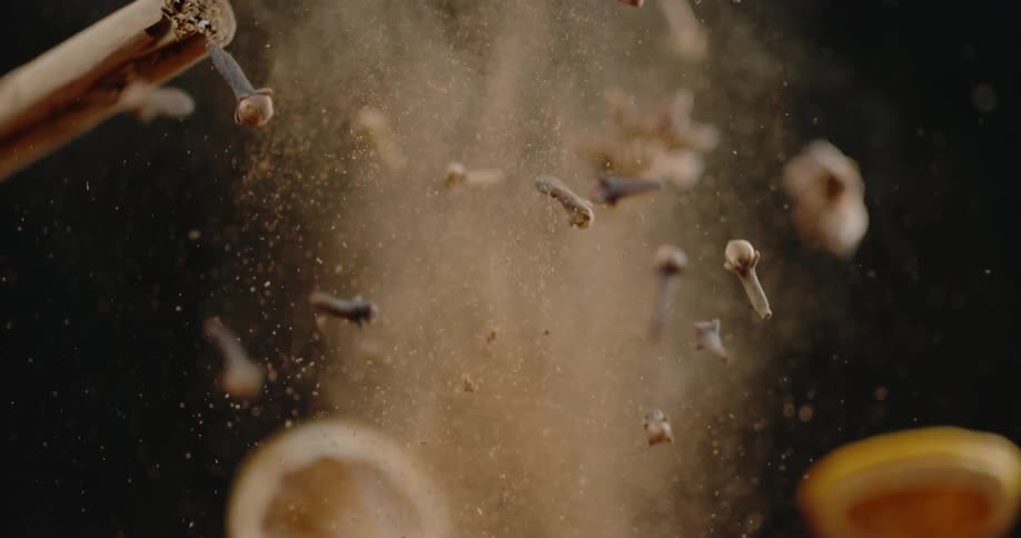 Spices fruit and powder being tossed into the air
