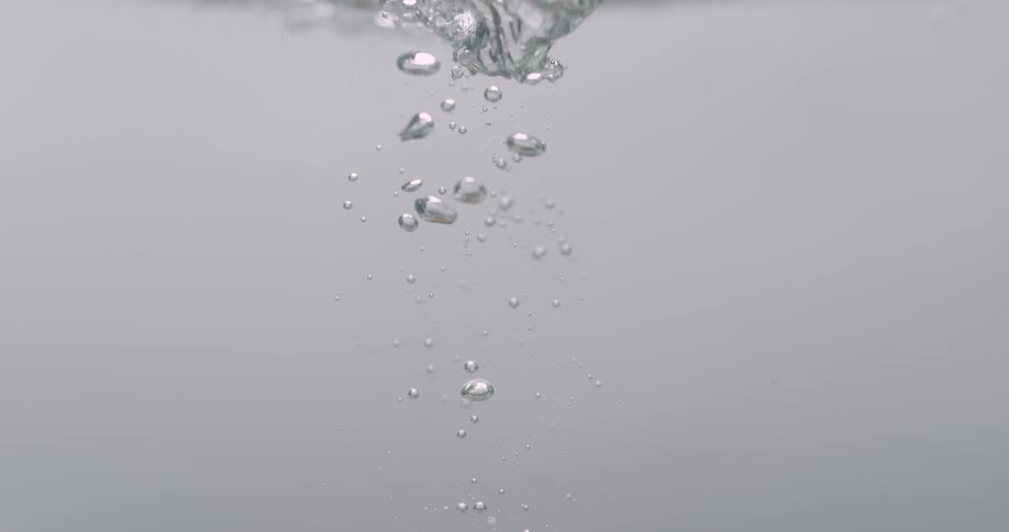 Bubbles of air float up in the water