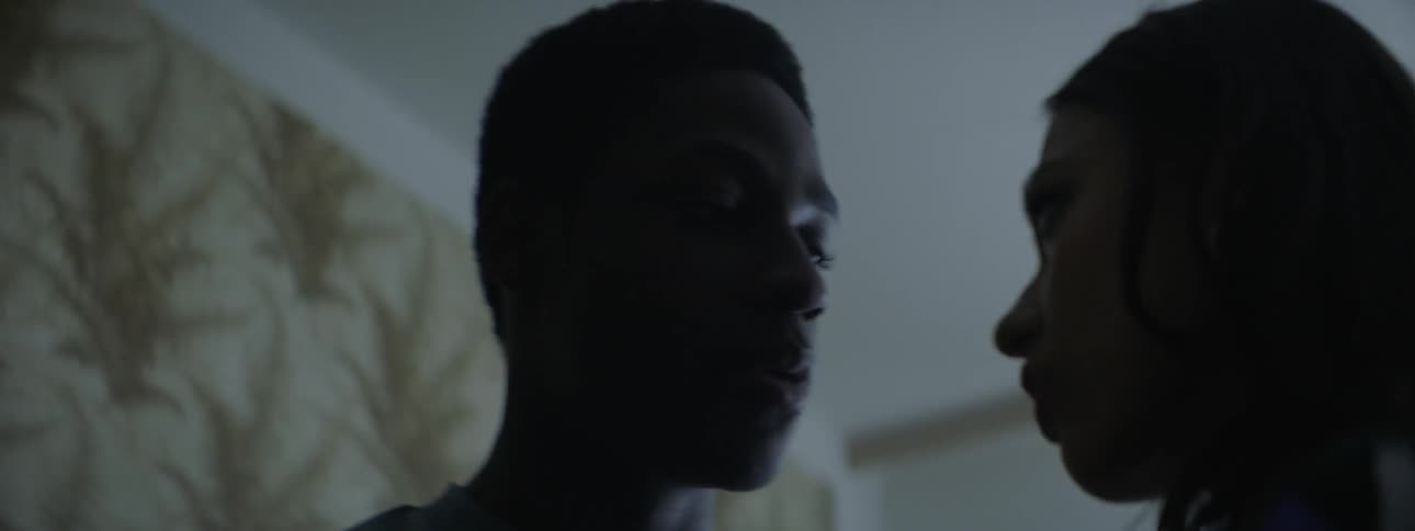 Two teenagers look in to each others eyes