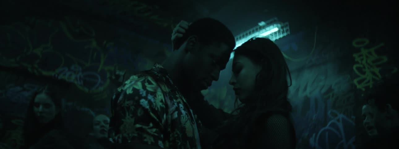 Couple dancing and flirting on party at nightclub