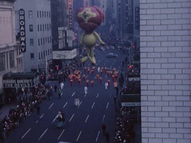 A lion balloon in a parade
