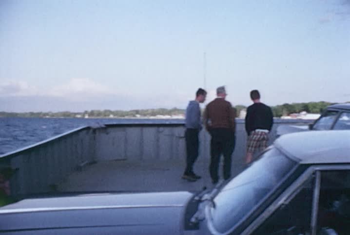 People ride on a ferry