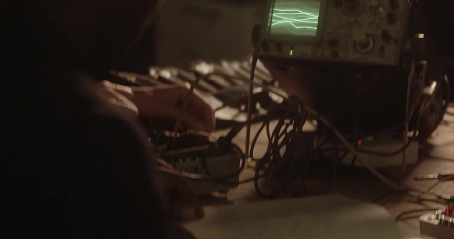 A man works on an electrical device