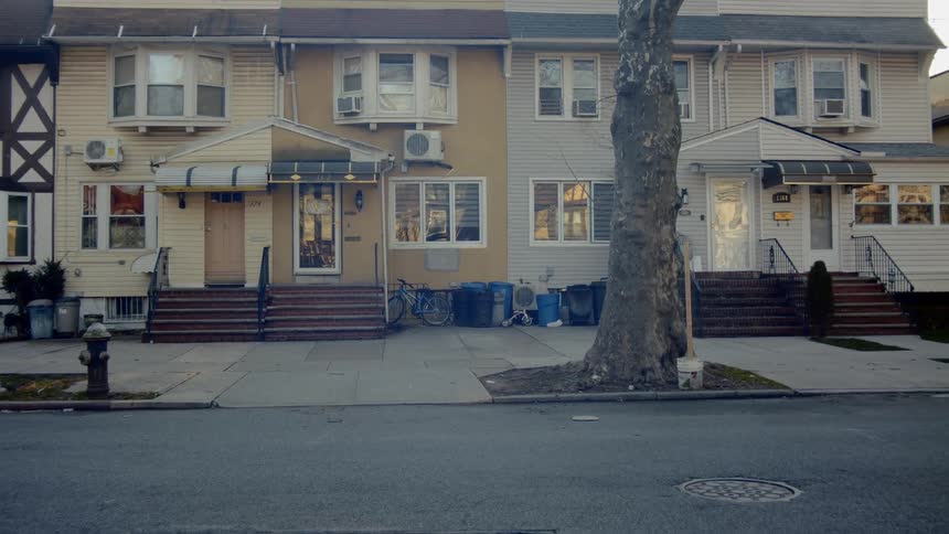 A row of townhouses in the evening