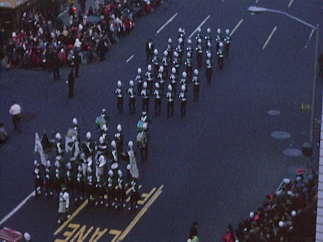 A marching band performs in a parade