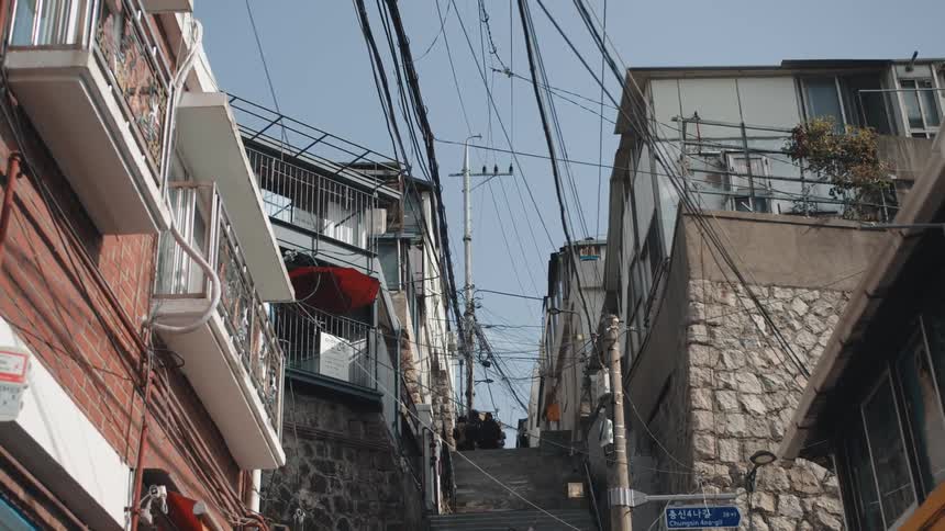 A neighborhood in korea during the day