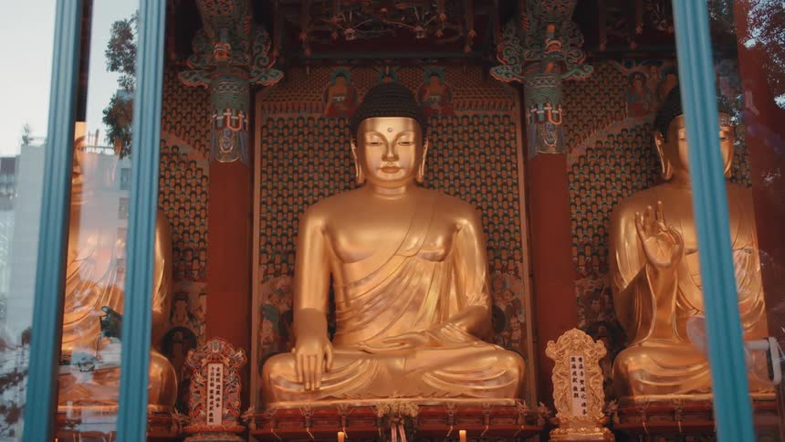 Buddha statues line the temple