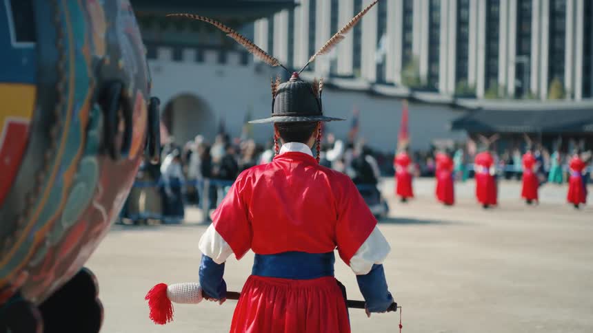 Chinese soldiers hold instruments in the square