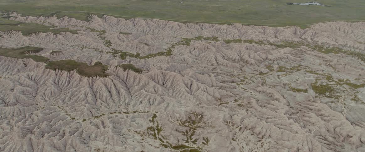 A rocky landscape near a field